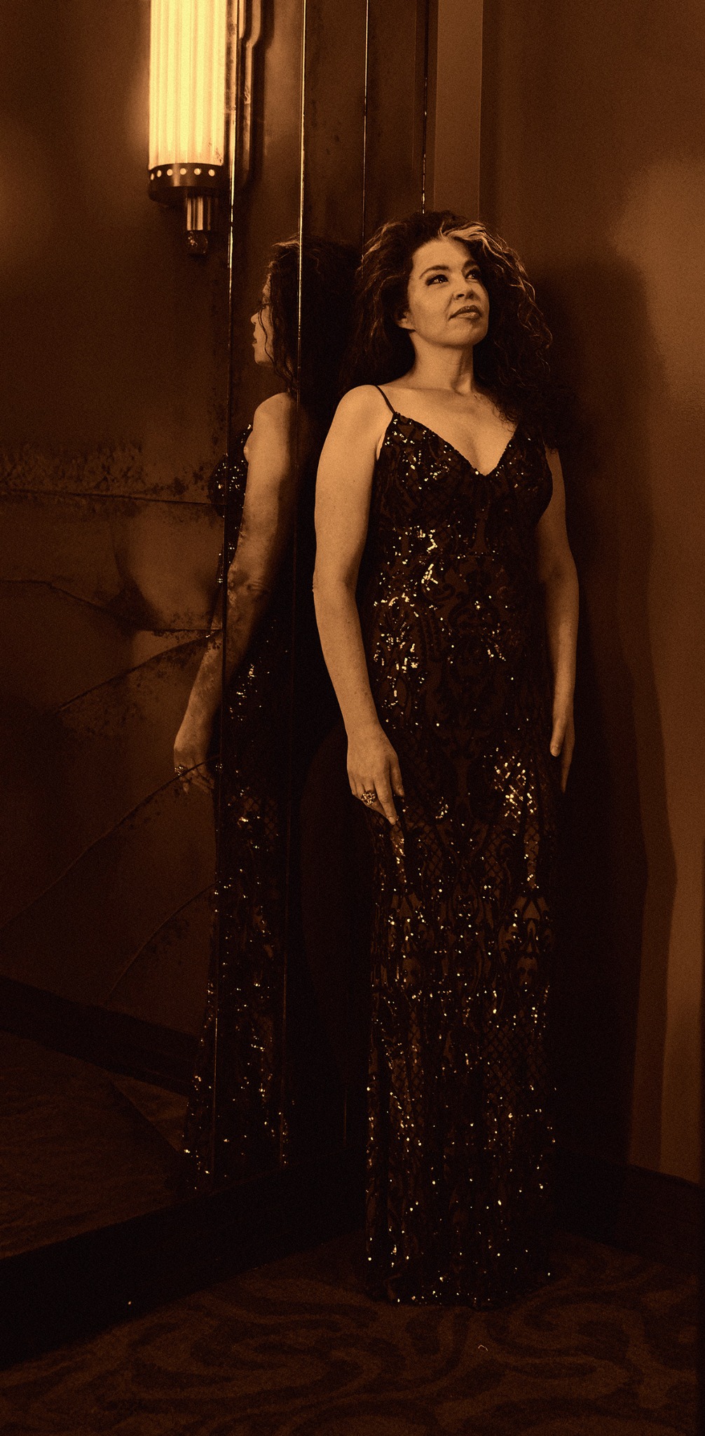 Jaimee Paul in a formal performance gown for Christmas Time Is Here